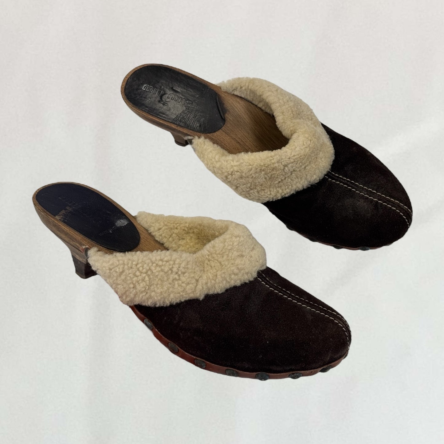 Miu Miu shearling clogs